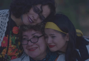 Picture of two young hispanic girls and their grandmother from the short film Joyride