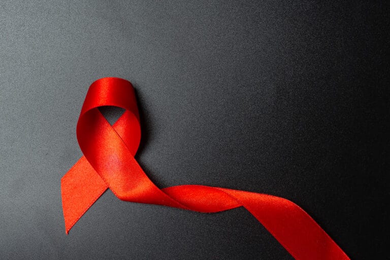 red ribbon with dark blue background