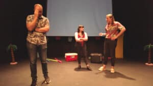Zephyr McAninch with Bluff City Liars crew on stage
