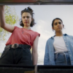 Watch or Wash? Our Review of Wacky Lesbian Buddy Comedy ‘Drive-Away Dolls’