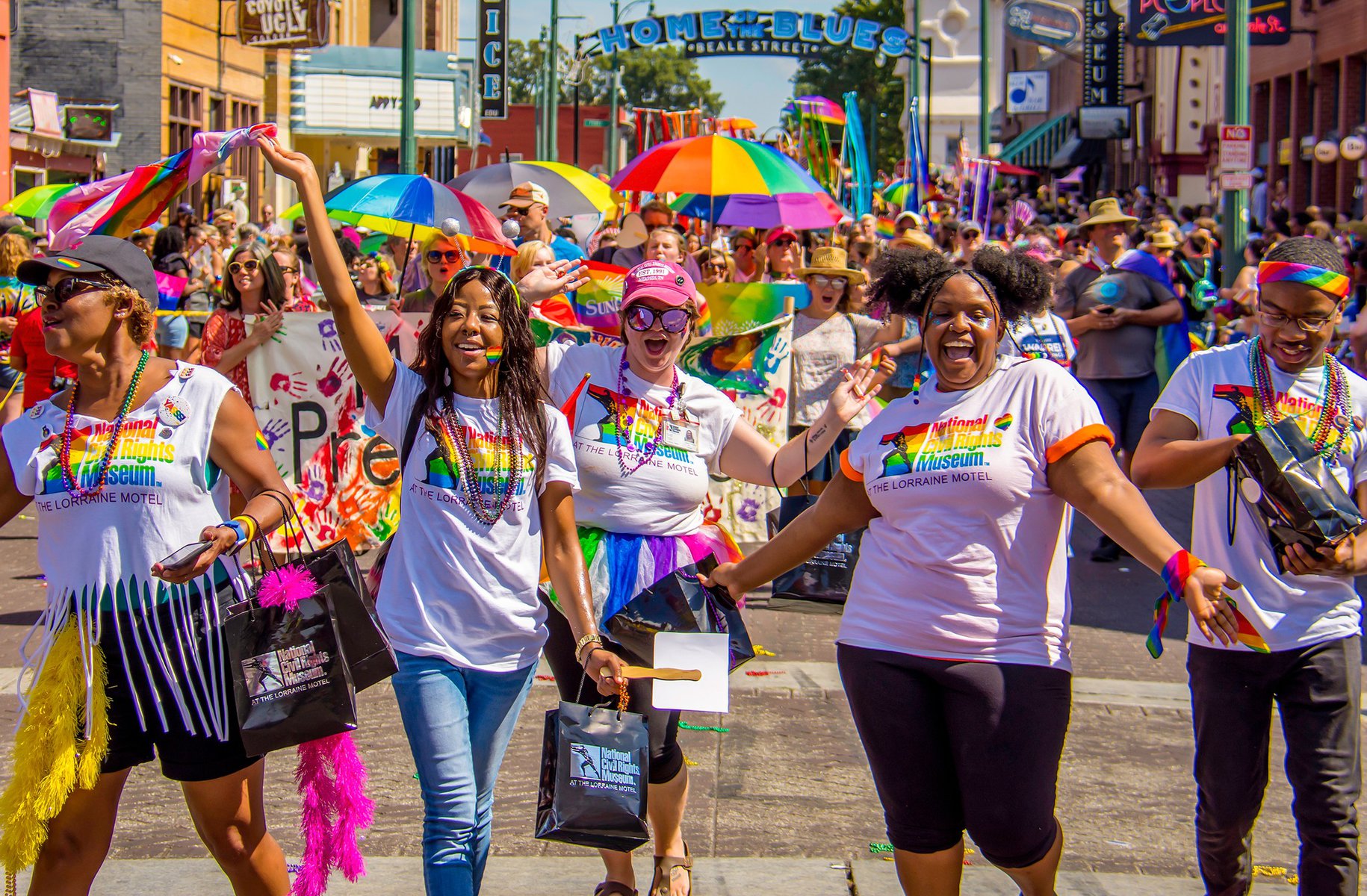 Memphis Midsouth Pride Fest LGBTQ people smiling on Beale Street