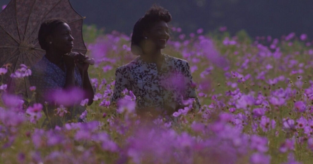 Screenshot from The Color Purple (1985) featuring Whoopie Goldberg as Celie and Margaret Avery as Shug. Directed by Stephen Spielberg. Warner Bros.