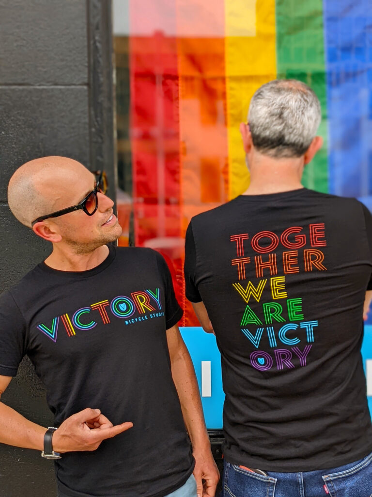 Victory Bicycle Studio staff in LGBT friendly attire