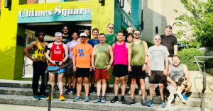 Friends Who Like to Run group photo outside in downtown Memphis