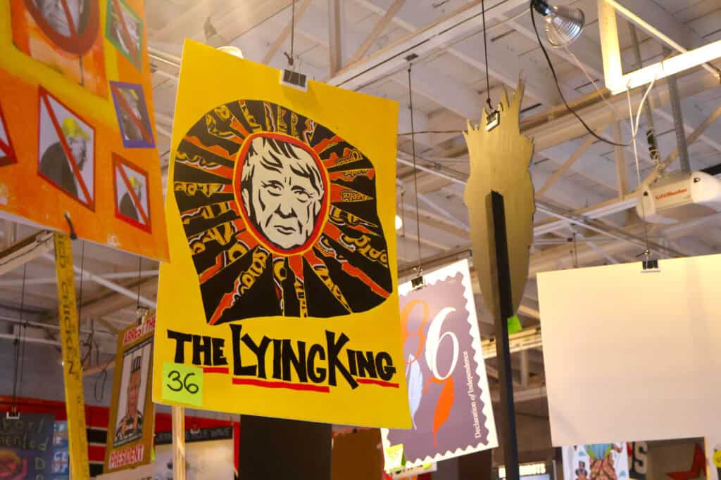 Colorful poster of The Lion King with a stylized lion's face and bold text. — focuslgbt.com