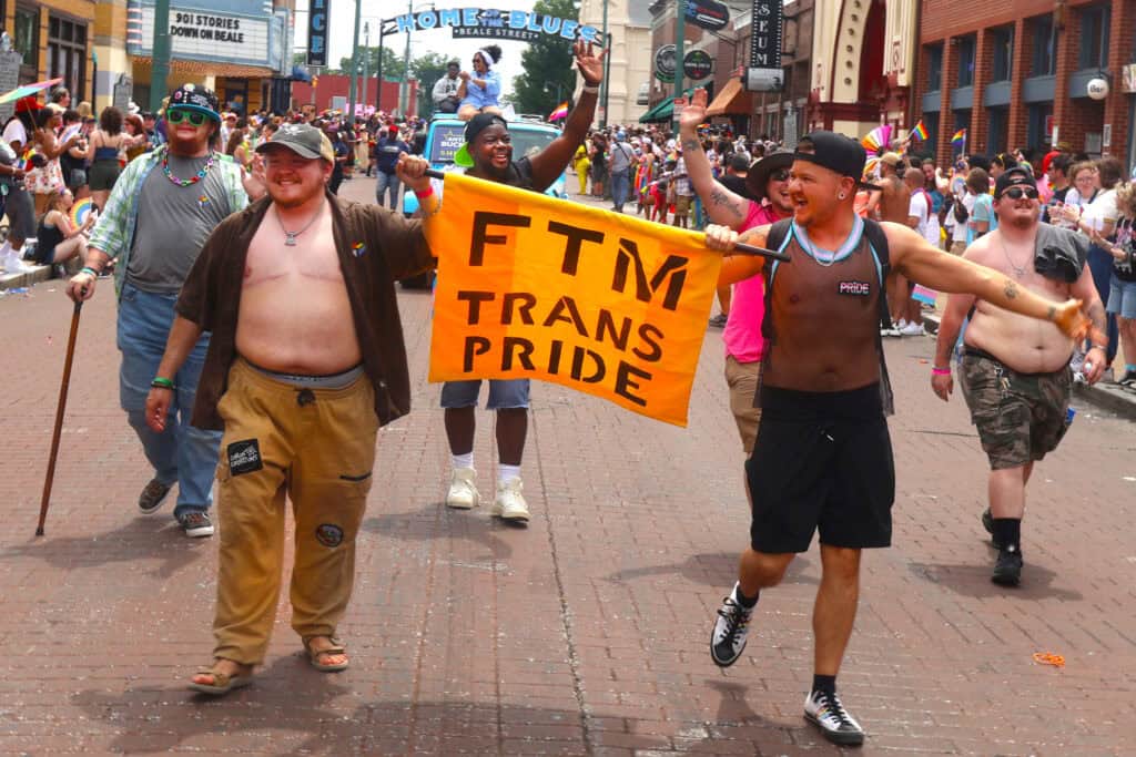 Performers in sequined gowns greet the crowd at Pride parade in Memphis. — focuslgbt.com